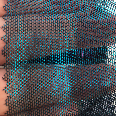 Turquoise on black metallic mesh