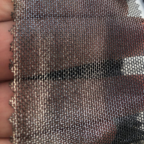 Silver on black metallic mesh
